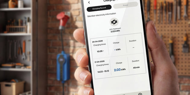 Mobile app charging overview next to a red CEE portable charger in a garage